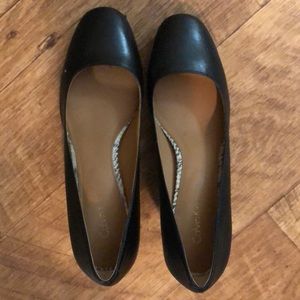 Black and snakeskin Calvin Klein heels